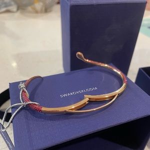 Swarovski
Rose Gold-Tone Pavé Snake Bangle Bracelet Fuchsia